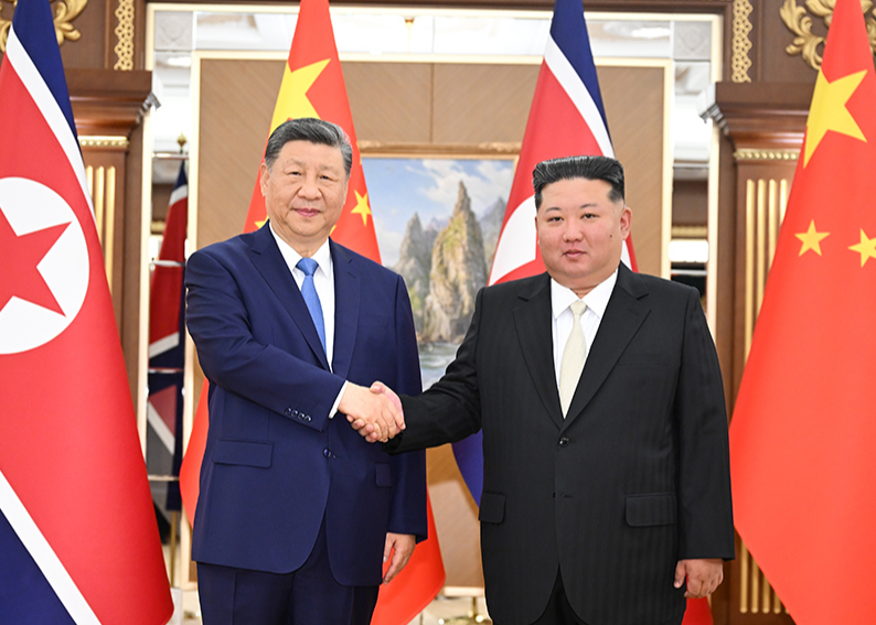习近平同金正恩举行会谈